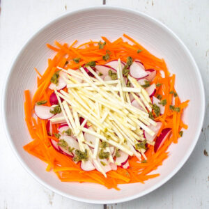 chopped remoulade ingredients in a white bowl