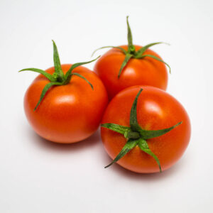 3 tomatoes on a white background