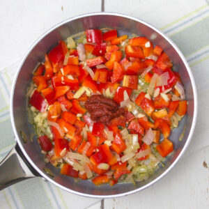 chopped vegetables with olive oil in a pan